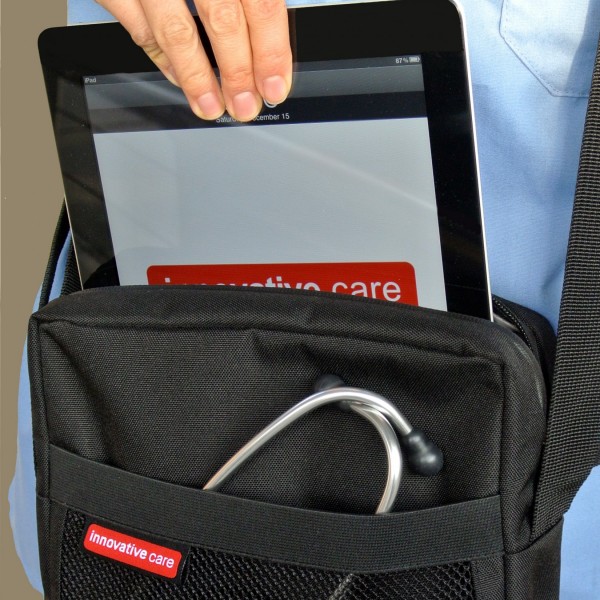 The iPad or tablet easily slides into the padded inside pocket.